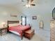 Bright main bedroom with neutral walls, ceiling fan, and a large window for natural light at 12723 Pinetop Way, Noblesville, IN 46060