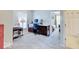 Upstairs office with built-in desk, shelving, and gray carpet at 12723 Pinetop Way, Noblesville, IN 46060