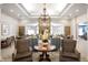 Elegant lobby featuring cozy seating and a beautiful chandelier at 12914 Shiraz Ln, Fishers, IN 46037