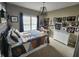 Cozy bedroom with a framed picture wall, a bright white dresser, and neutral earth tone accents at 1302 Country Creek Cir, Shelbyville, IN 46176