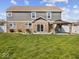Patio with outdoor seating under a gazebo in a well-maintained backyard at 1305 Bontrager Ln, Shelbyville, IN 46176