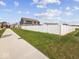 Large fenced-in backyard with plenty of green space, perfect for outdoor activities at 1305 Bontrager Ln, Shelbyville, IN 46176