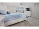Inviting bedroom with a comfortable bed, soft blue accents, and ample natural light at 1305 Bontrager Ln, Shelbyville, IN 46176