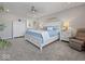 Spacious bedroom with a plush bed, dresser, and relaxing decor at 1305 Bontrager Ln, Shelbyville, IN 46176