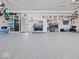 Well-organized garage featuring ample storage solutions and epoxy floors at 1305 Bontrager Ln, Shelbyville, IN 46176
