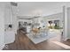 Bright, open kitchen and dining area featuring white cabinetry and stainless steel appliances at 1305 Bontrager Ln, Shelbyville, IN 46176