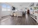 Open-concept living room features a fireplace and large windows for ample natural light at 1305 Bontrager Ln, Shelbyville, IN 46176