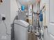 Utility room featuring a water heater, furnace, and water softener at 1305 Bontrager Ln, Shelbyville, IN 46176