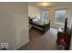 Cozy bedroom features natural light from two windows and traditional decor at 1573 Vera Blvd, Danville, IN 46122