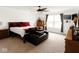 Bright bedroom with large window, wood furniture, and comfortable seating at 1573 Vera Blvd, Danville, IN 46122