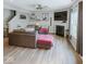 Open concept living room features a fireplace, wood flooring, neutral color palette and lots of light at 1573 Vera Blvd, Danville, IN 46122