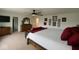 Spacious main bedroom featuring a comfortable bed, dresser, TV, and stylish decor for a relaxing retreat at 1573 Vera Blvd, Danville, IN 46122