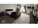 Spacious main bedroom with large window and carpeting throughout at 1573 Vera Blvd, Danville, IN 46122