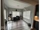 Bright office space with a large window, modern lighting, and hardwood floors at 1573 Vera Blvd, Danville, IN 46122