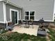 Outdoor patio area with dining set and barbecue grill, perfect for entertaining guests in the backyard at 1573 Vera Blvd, Danville, IN 46122