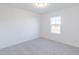 Cozy bedroom with neutral carpet, natural light, and ample electrical outlets at 15970 Meadow Frost Ct, Fishers, IN 46037