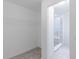 Walk-in closet that opens to the marble tiled shower at 15970 Meadow Frost Ct, Fishers, IN 46037