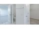 Hallway showing a toilet and a closet with wire rack shelving at 15970 Meadow Frost Ct, Fishers, IN 46037