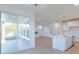 Open-concept kitchen featuring stainless appliances, shaker cabinets, and a large kitchen island at 15970 Meadow Frost Ct, Fishers, IN 46037