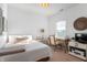 Bright bedroom with a bed, side table, desk and chair for study and decoration at 1614 Waterleaf Dr, Westfield, IN 46074