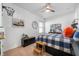 Fun bedroom with a basketball theme, including a hoop, bedding, and colorful decor at 1614 Waterleaf Dr, Westfield, IN 46074