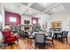 Spacious clubhouse with fireplace, built-in shelves, tables, and chairs for community gatherings and socializing at 1614 Waterleaf Dr, Westfield, IN 46074