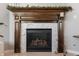 Close up of the fireplace with white and grey herringbone tile and a dark wood mantel at 1614 Waterleaf Dr, Westfield, IN 46074