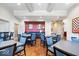 Well-lit game room boasts tables, chairs, and stylish decor for entertainment and recreational activities at 1614 Waterleaf Dr, Westfield, IN 46074
