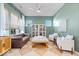 Inviting living room with stylish decor, large windows, and ample natural light that creates a warm ambiance at 1614 Waterleaf Dr, Westfield, IN 46074