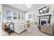Bright and spacious living room with fireplace and large windows at 1614 Waterleaf Dr, Westfield, IN 46074