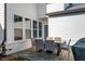 Outdoor patio with a stone paver base, set up with a dining table and chairs at 1614 Waterleaf Dr, Westfield, IN 46074