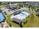 Aerial view of a clubhouse pool area, featuring a baby pool and heart shaped pool with lounge chairs at 1614 Waterleaf Dr, Westfield, IN 46074