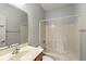 Simple bathroom featuring a single sink vanity, toilet, and shower/tub enclosure at 16350 Quartz Dr, Noblesville, IN 46060