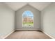 Bright bedroom with large arched window providing great natural light at 16350 Quartz Dr, Noblesville, IN 46060