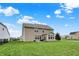 Expansive backyard with lush green grass and a patio area perfect for outdoor entertaining at 16758 Bingham Dr, Westfield, IN 46074