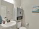 Well-lit bathroom with gray vanity and decorative accents at 16758 Bingham Dr, Westfield, IN 46074