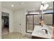 Stylish bathroom boasts a double sink vanity, framed mirror, and a glass-enclosed shower at 16758 Bingham Dr, Westfield, IN 46074
