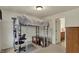 Modern bedroom featuring a lofted bed with a built-in desk and an adjacent bathroom at 16758 Bingham Dr, Westfield, IN 46074
