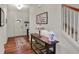 Inviting foyer with hardwood floors, a decorative table, and staircase at 16758 Bingham Dr, Westfield, IN 46074