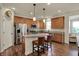 Modern kitchen with stainless steel appliances, granite countertops, and a kitchen island at 16758 Bingham Dr, Westfield, IN 46074