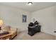 Functional home office space with traditional furnishings and carpeted floors at 16758 Bingham Dr, Westfield, IN 46074