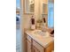 Bathroom featuring single sink vanity, neutral paint, and decor at 1696 Carlton Dr, Greenfield, IN 46140