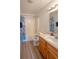 Bathroom features a shower/tub combo with a single sink vanity and modern fixtures at 1696 Carlton Dr, Greenfield, IN 46140