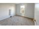 Cozy bedroom features natural light, carpeting, and is perfect for relaxation at 1696 Carlton Dr, Greenfield, IN 46140