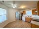 Bright kitchen with wood cabinets, stainless steel appliances, and new hard surface flooring at 1696 Carlton Dr, Greenfield, IN 46140