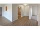 Bright living space with laminate floors and access to other rooms at 1696 Carlton Dr, Greenfield, IN 46140