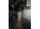 Basement featuring a modern hot water heater and some visible ductwork at 1710 Thaddeus St, Indianapolis, IN 46203