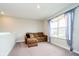 Cozy living room with comfortable seating at 17301 Tribute Row, Noblesville, IN 46060