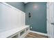Organized mudroom with bench seating and storage at 17301 Tribute Row, Noblesville, IN 46060