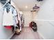 Organized walk-in closet with shelving and ample storage space for clothing at 17301 Tribute Row, Noblesville, IN 46060